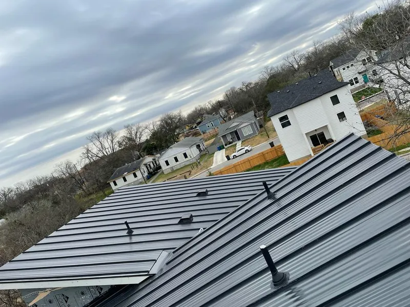Standing seam metal roof panels with vents for Skylight Repair in Little Falls